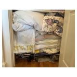Mixed lot of bedding. (Master hallway closet)