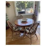 Dinning table and 4 chairs with floral cushions