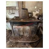 cast-iron Franklin style wood-burning stove BRING