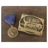 Brass Archers competition medal and buckle