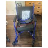 Blue Wheel Chair with hand brakes - Looks new