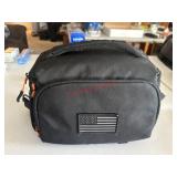 Padded American Flag Bag with headphones contents