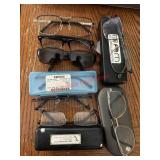 Glasses and sunglasses lot               (living
