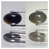 0.56ct 7.7x5.3mm Oval Cabochon Natural Black Opal