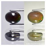 0.79ct 7.7x6mm Oval Cabochon Natural Black Opal -
