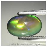 0.54ct 8.2x5.2mm Oval Cabochon Natural Black Opal