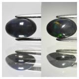 0.67ct 8x5.3mm Oval Cabochon Natural Black Opal -