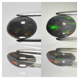 0.71ct 8x6mm Oval Cabochon Natural Black Opal - Co