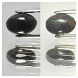 0.82ct 8.5x6mm Oval Cabochon Natural Black Opal -