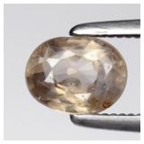 0.84ct 5.8x4.5mm Oval Natural Light Champagne Zirc