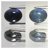 0.78ct 7.6x6mm Oval Cabochon Natural Black Opal -