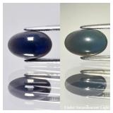 0.91ct 9.3x6mm Oval Cabochon Natural Black Opal -