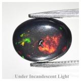1.23ct 9.3x7mm Oval Cabochon Natural Black Opal -