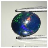 0.70ct 7x5.8mm Oval Cabochon Natural Black Opal -