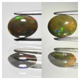 0.72ct 8x6mm Oval Cabochon Natural Black Opal - Co