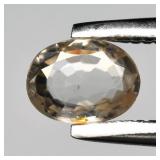 0.39ct 4.8x3.5mm VS Oval Natural Light Champagne Z