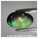 0.63ct 8x5.5mm Oval Cabochon Natural Black Opal -