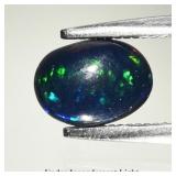 0.41ct 6.7x5mm Oval Cabochon Natural Black Opal -