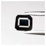 0.58ct 4.7x4.3mm VS Octagon Natural Deep Blue Spin