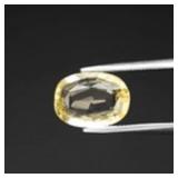 1.67ct 9.5x7mm Oval Natural Yellow Scapolite - Tan