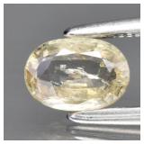 0.69ct 6x4.3mm Oval Light Yellowish Green Sapphire