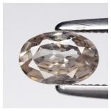 0.51ct 5.7x3.8mm Oval Natural Light Champagne Zirc