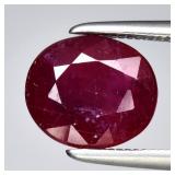 2.57ct 8x7mm Oval Purplish Red Ruby - Heated Glass
