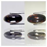 0.72ct 9.5x4.8mm Oval Cabochon Natural Black Opal