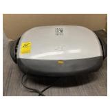 GEORGE FOREMAN GRILLING MACHINE
