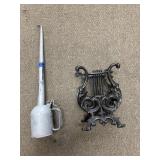VINTAGE OIL CAN & CAST IRON MAGAZINE RACK