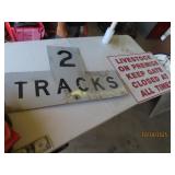 (2) vintage 24"ish LIVESTOCK & 2Tracks Metal Signs