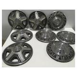 2 sets of mustang hubcaps