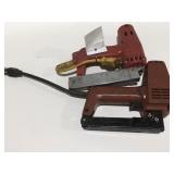 Two electric staple guns