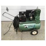 Sears portable air compressor runs and holds