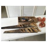 Hand saws, trowels ,files, an electric light