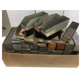 Approximately 38 metal parts bins
