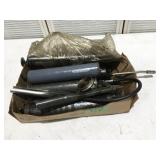 Box of grease guns, and parts