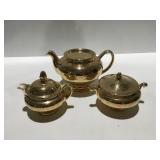 Eggshell, nautilus, tea pot, cream and sugar