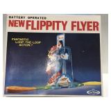 Vintage, battery-operated new flippity flyer