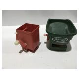 Two hand seeders spreaders