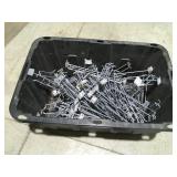 Pegboard display board hooks in a tote