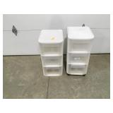 2 plastic storage units 25" each tall