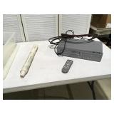 DVD VHS combo player in tote