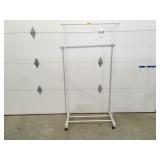 Rolling clothes rack 68" x 35"