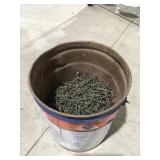 Half a bucket of 2 1/2 inch nails