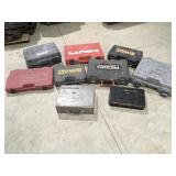 10 empty toolboxes