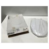 Kohler elongated , toilet seat, white unused