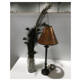 Table lamp, and peacock feathers