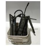 Three grease guns