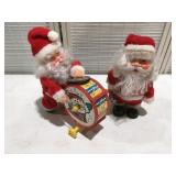 2 battery operated Santa Claus untested